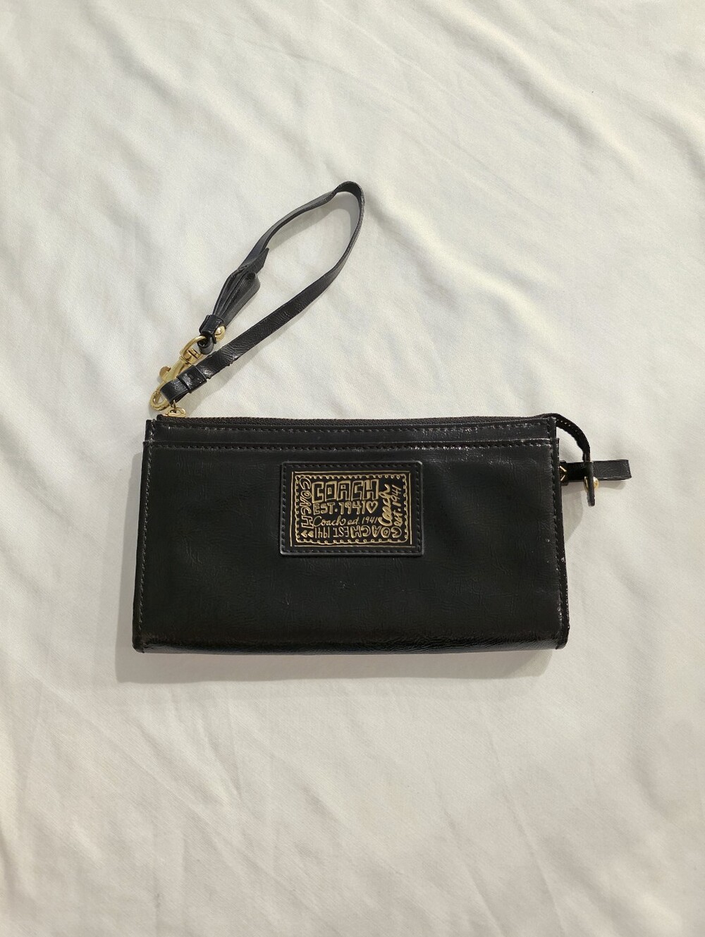 Coach Poppy Black And Gold Wristlet Wallet